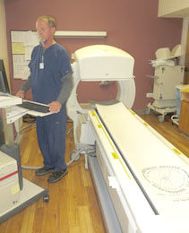 Nuclear Med techician Will Herring sets the new nuclear medicine camera at Cannon Hospital. 