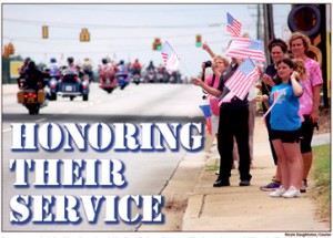 Supporters packed the sidewalks and roadsides from Easley to Seneca on Monday as the annual “Honoring Their Service” parade made its way to Keowee Key.