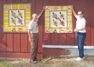 Lucy and Dale Harward’s Hay Day Farm has joined the Upstate Heritage Quilt Trail. Above, the couple show off the quilt.