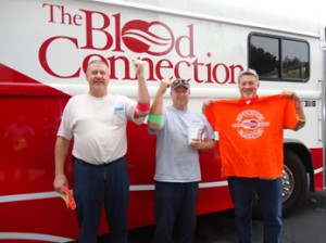 Blue Ridge Electric employees Sam Baker, Anson Perry and Mark Littlejohn proudly rolled up their sleeves at last year’s semi-annual drive and walked away with a free t-shirt for donating.