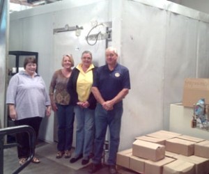 The Pickens Rotary Club recently donated a freezer to Gleaning House Ministries. Pictured are Rotarians Linda Cassell, Teresa Nash, Jeannie Gilstrap and John McKenzie at Gleaning House Ministries volunteering and dedicating the new freezer. 