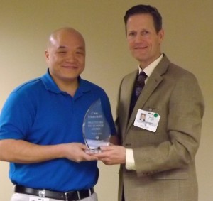 Baptist Easley CEO Michael Batchelor is pictured Dr. David Chang.