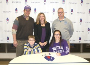 Pickens High School soccer goalkeeper Sara Dooley signed last week to play her college soccer at Western Carolina University. Pictured are Brian Dooley, Dawn Dooley, Pickens soccer coach Frank Sullivan, Jackson Dooley and Sara Dooley.