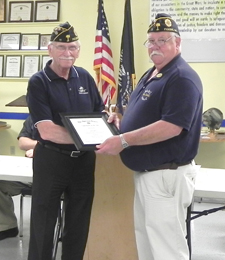 American Legion Pickens Post 11 Commander Ken Keith presented the Legionnaire of the Year Award to Pete Peters on May 26. Peters, a former post commander, was honored for his service with the organization over the past year. 