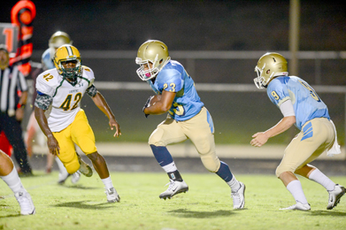 John Bolton/BoltonPhoto.com Seen here carrying the ball Friday night against Laurens, senior Stephon Kirksey has wrapped up the Lions’ vacant running back spot, Daniel coach Randy Robinson said.