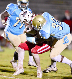 John Bolton/BoltonPhoto.com Daniel’s Jaelon Reese takes down a Palmetto ballcarrier during the Lions’ 37-7 win over the Mustangs on Friday night at Singleton Field. After Palmetto took an early lead, the Daniel defense turned up the pressure and held the Mustangs to just 60 yards of total offense in the dominating win, the program’s 500th all-time victory.