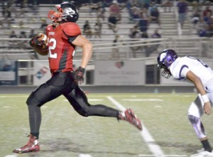 Brandy Karr/Photo Liberty’s Tyler Renaud breaks free for a 70-yard touchdown run during the Red Devils’ win over Walhalla on Friday night.