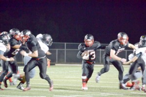 Brandy Karr/Photo Liberty’s Shaun Karr finds running room against Landrum on Friday night.