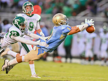 John Bolton/BoltonPhoto.com Daniel receiver Carter Groomes stretches unsuccessfully for a pass Friday night at Singleton Field.