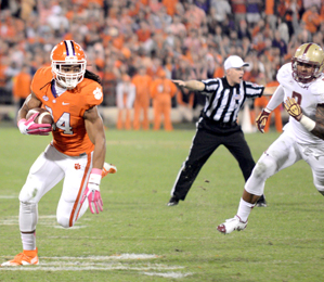 Kerry Gilstrap/Courier Clemson senior running back Zac Brooks, seen here carrying the ball against Boston College on Oct. 17, scored a touchdown for the third week in a row in the Tigers’ 58-0 win at Miami.