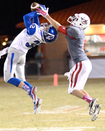 Tommy McGaha/seeyourphotohere.com Pickens senior Adam Thomas makes a leaping interception in front of a Palmetto receiver on Friday night. Thomas had two interceptions on the night.