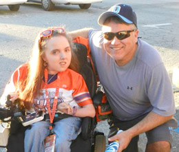 Courtesy Photo Daniel High School football coach Randy Robinson helped Kathryn Hicks get a chance to meet coach Dabo Swinney and Tiger players at Clemson football practice earlier this month.