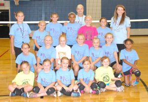 Front row, from left: Abby Earnhardt, Tara Ann Rogers, Macie Claire Sickels, Brooke Duncan, Kloe Parvis. Second row: Hannah Poore, Ella Cook, Lillie Hyatt, Callie Ratcliff, Mili Claire Seffrin, Callie Johnson, Jordan Maw. Third row: Coach Amber Chapman, Alyssa Whiteside, Holly Lee, Britain Dunn, Anna Claire Durham, Katelyn Porter, and Coach Annika Jones. Fourth row: Coach Peggy Anthony. Absent: Campbell Nix.